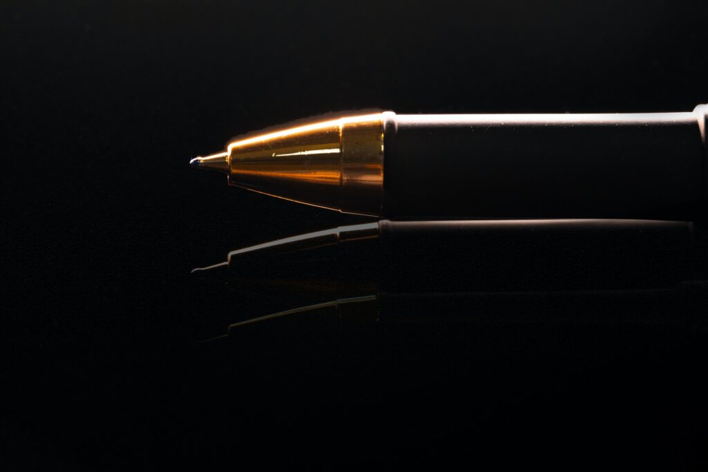 Close up of a pen on black background